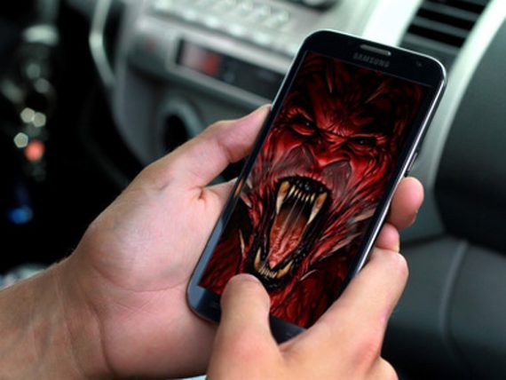 satan is in a cell phone II 570x428