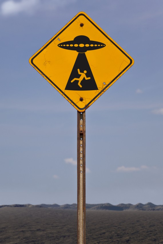 Road sign warning of alien abduction
