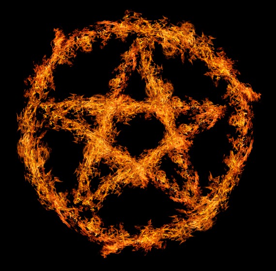 orange flame pentagram isolated on black