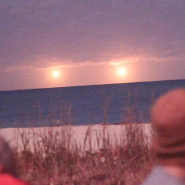 Twin UFOs in Florida and One Checking the Time in England