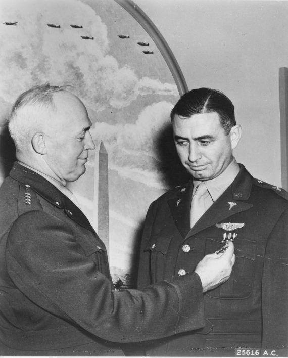 LOVELACE William R  II LCOL USAMC receives DFC from General Hap Arnold USAAF1 1 570x708