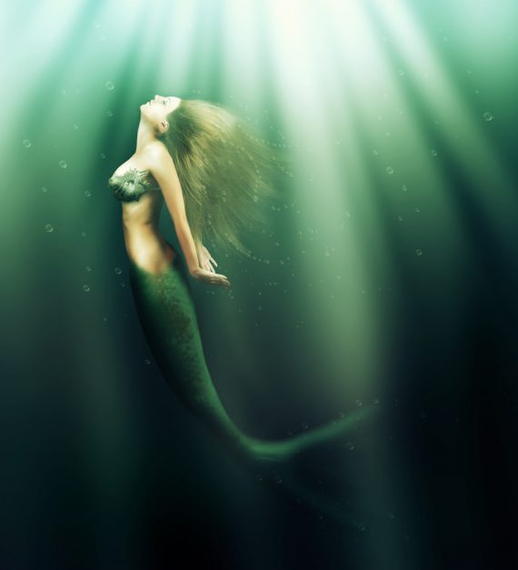 beautiful woman mermaid with fish tail