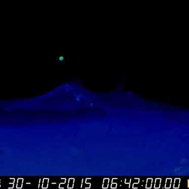 Green UFO Seen Entering Mount Etna Volcano on Sicily