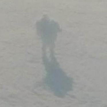 Giant Humanoid, Sun Cross and Winged Object in the Sky