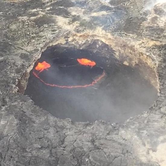 Mysterious Smiley Face Appears In Erupting Volcano