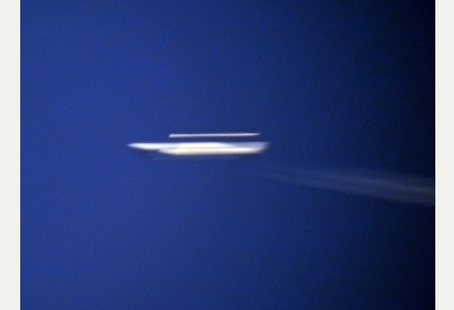 Man Photographs Eight UFOs and Some Aliens in Three Months