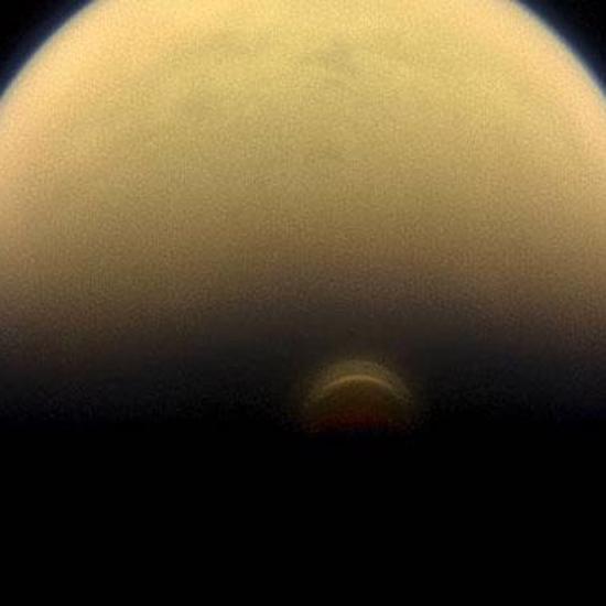 Unexplained Ice Cloud Suddenly Appears Over Saturn’s Moon
