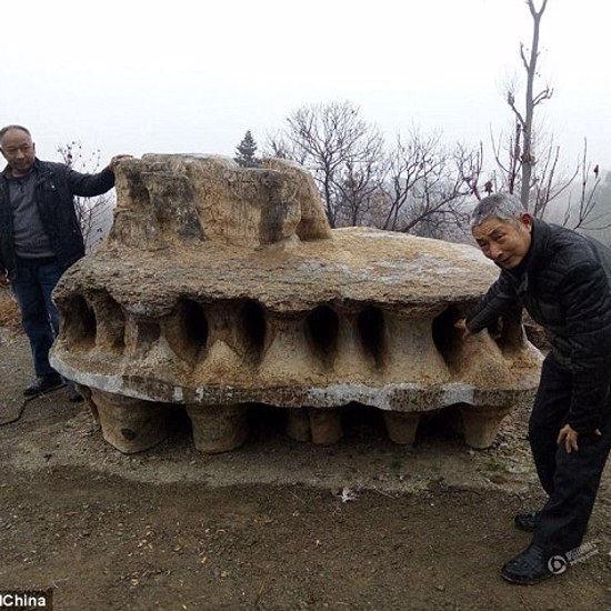 UFO-Shaped Rock Discovered on Mountain in China