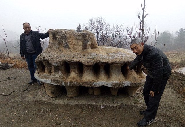UFO-Shaped Rock Discovered on Mountain in China