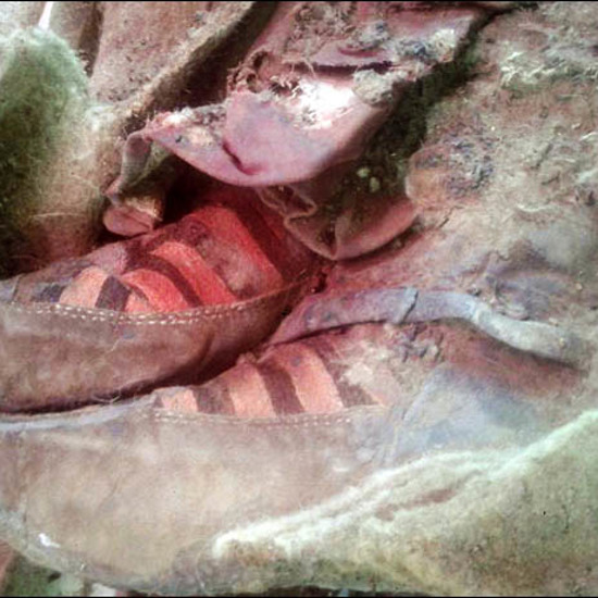 1,000-Year-Old Mummy Found Buried in Adidas Boots