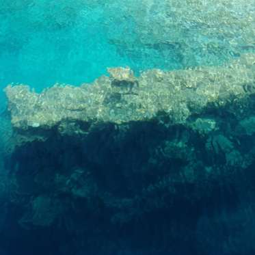 Ancient “Spells” Found Carved into Stones Surrounding Underwater Castle