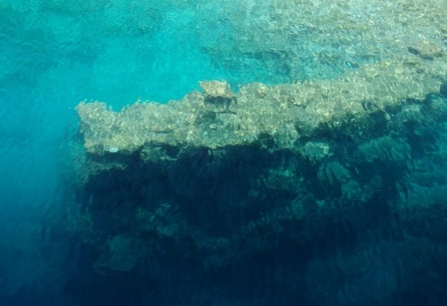 Ancient “Spells” Found Carved into Stones Surrounding Underwater Castle