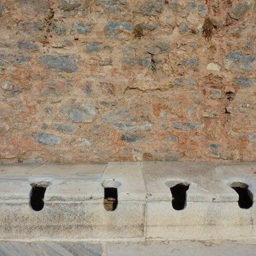 Dirty Jokes Found on Floor of Ancient Roman Latrine