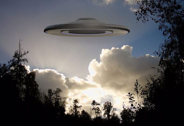 Disc Shaped UFO Filmed Darting Through Clouds Over Scotland