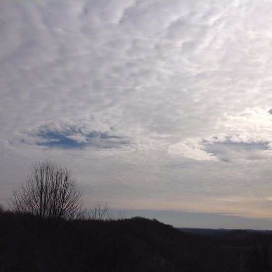 Mysterious “UFO” Was In Fact An Eerie-Looking Hole Punch Cloud