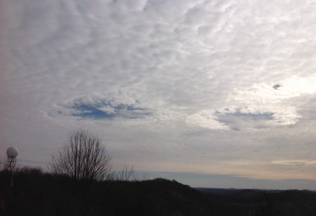 Mysterious “UFO” Was In Fact An Eerie-Looking Hole Punch Cloud