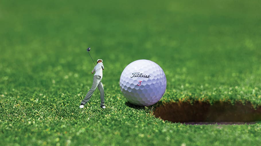 golfers miniature golf ball meadow golf sport