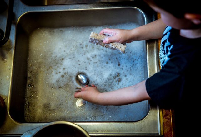 Photo Seemingly Captured a “Ghost Washing the Dishes” in Deceased Man’s Home