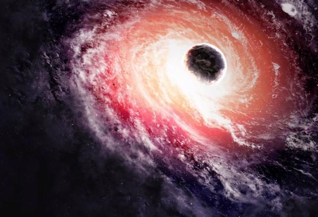 A Supermassive Black Hole is Speeding Through Universe Trailing Newborn Stars